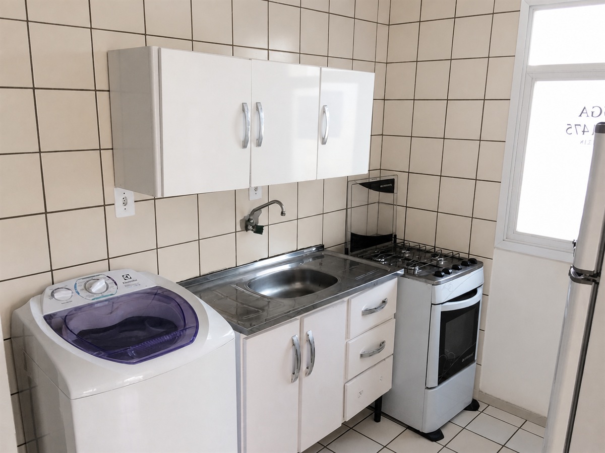 Armários da cozinha e bancada com pia